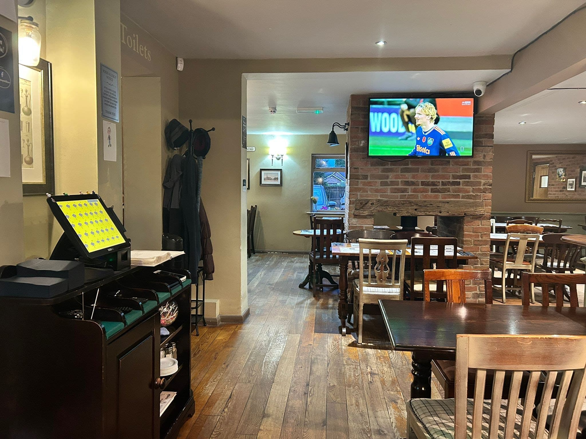 Sports viewing area with large screen TVs at The Railway